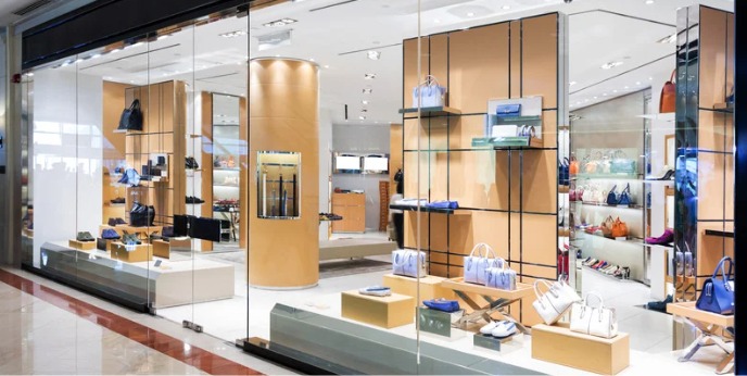 Marble and brass retail counter in UAE fashion shop